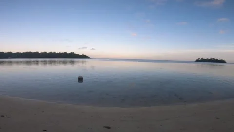 Walking on beach side during low tide sunset time with beautiful ocean water ref Stock Footage 252179438