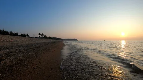 Walking on the beach at sunset Video stock 108786228