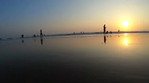 Walking on the beach with the sunset view Stock Footage 137087499
