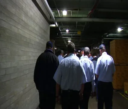 Walking behind workers in warehouse Stock Footage 21591187