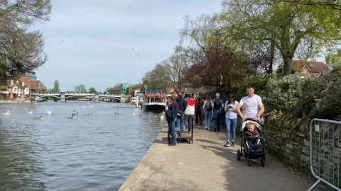 Walking beside The River Thames at Windsor Stock Footage 182166667