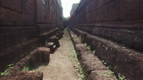 Walking in between Ankor Temple in cambodia, antique and historic sight in a Stock Footage 145286197