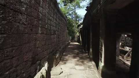 Walking in between Ankor Temple in cambodia, antique and historic sight in a Stock Footage 145297792