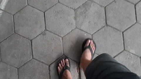 Walking on the block using only sandals 스톡 동영상 217851353