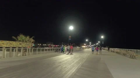 Walking on the boardwalk Stock Footage