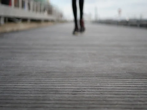Walking on the Boardwalk Towards the Camera Stock Footage 74603620