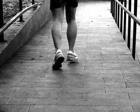 Walking on Brick Pathway Stock Photos