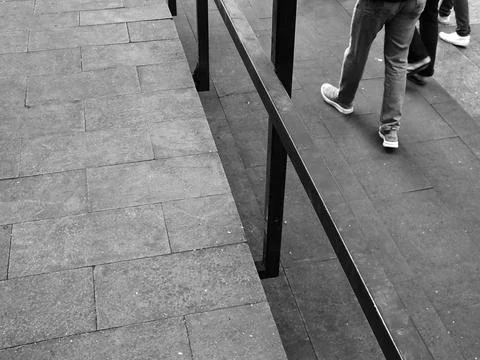 Walking on Brick Pathway Stock Photos