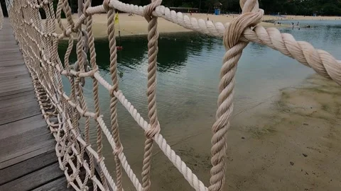 Walking on a bridge at a beach Stock Footage 155887911