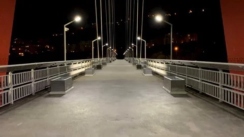 Walking on a bridge at night Video stock 106399974