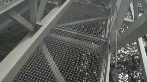 Walking on a bridge over the river Stock Footage 52823667