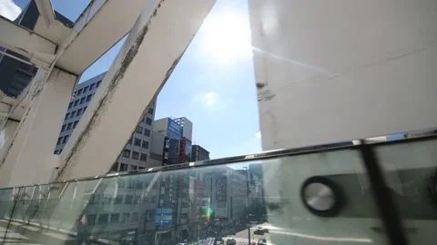 Walking the bridge over the road in Tokyo Japan. Stock Footage 220098038
