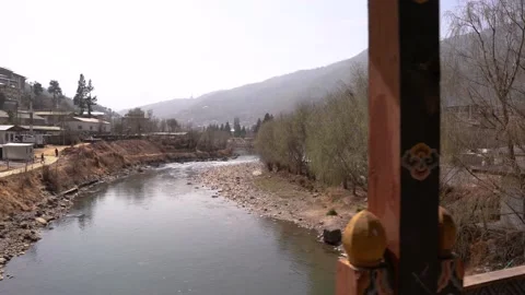 Walking on the bridge with a view of river in Thimphu, Bhutan Stock Footage 236001641
