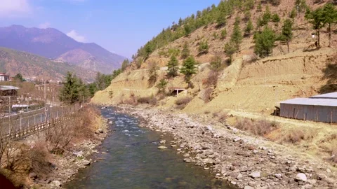 Walking on the bridge with a view of river in Thimphu, Bhutan Stock Footage 236001708