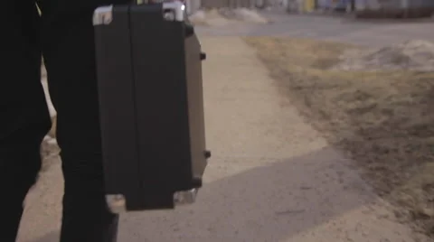 Walking with briefcase Stock Footage 57245810