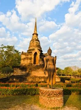 Walking buddha statue Stock Photos