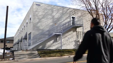 Walking To Building Stockbeeldmateriaal 123559394