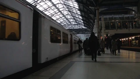 Walking on busy train platform Liverpool street London steady cam hd Stock Footage 72065476