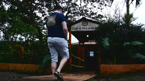 Walking into cafe macadamia Stock Footage 126551006