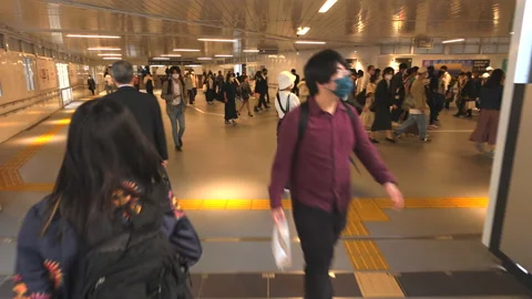 The walking camera walks on the passageway in Shibuya Tokyo Japan Stock-Footage 210237837