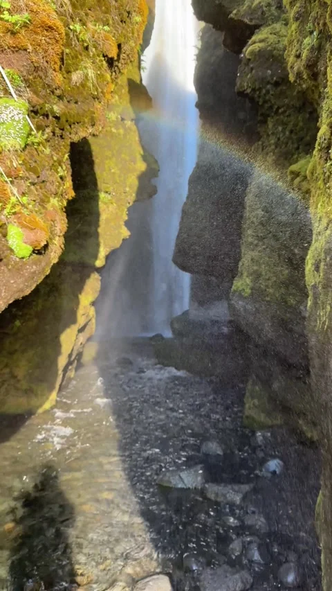 Walking into the canyon towards Gljufrabui waterfall hidden inside the gorge Stock Footage 331560134