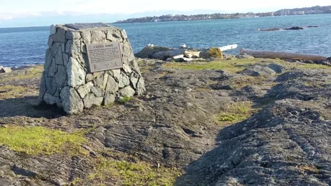 Walking up to  Cattle Point marker Stock Footage 190821152