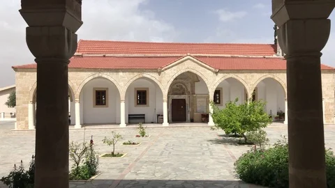 Walking to the church of Saint George Monastery in Larnaca Stock Footage 89567310