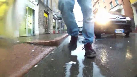 Walking in the city in the rain Stock Footage 69143167