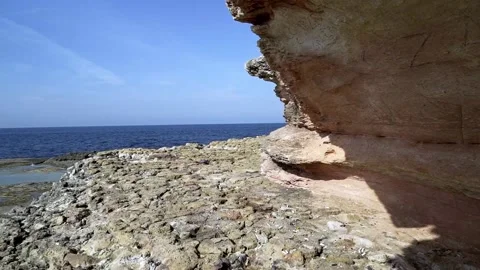 Walking on the cliff by the sea Stock Footage 167584936