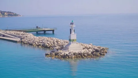 Walking on cliffs above coast line and amazing secret Beach, POV Stock Footage 77297238