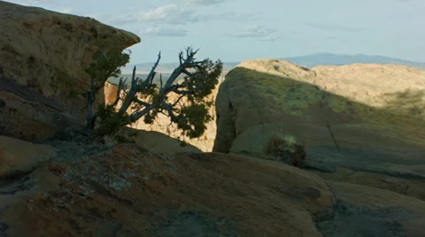 Walking the Cliffs Edge at the El Malpais in NM Stock Footage 63383023