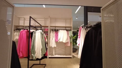 Walking in a clothing store Video stock 245588998