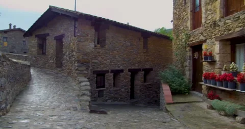 Walking the cobbled streets of Beget, a medieval small town in Catalonia, Spain. Stock Footage 267016783