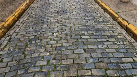 Walking on cobblestone streets in old san juan puerto rico blue stone Stock Footage 277478179