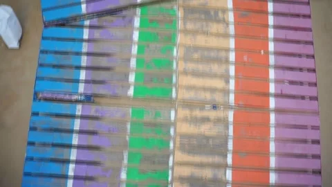 Walking on a colorful deck by the beach Stock Footage 270234847