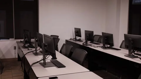 Walking into computer student lab Video stock 322906792