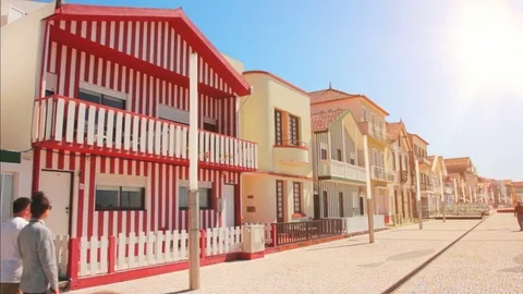 Walking Couple of Tourists on Beach path, Aveiro. Portugal Stock Footage 82397701