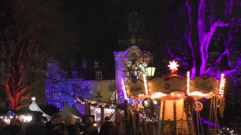 Walking crowd in front of Bueckeburger Castle at the Christmas Market Stock Footage 99542306