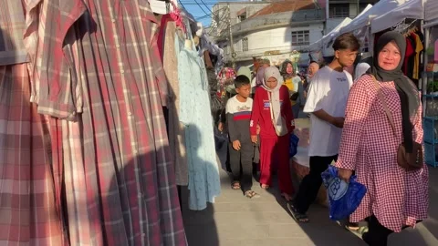 Walking on a crowded strip at evening. Ramadan festivities in town. Stock Footage 238018968