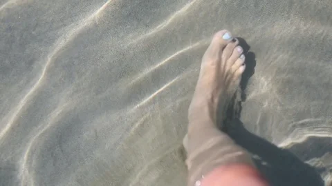 Walking in crystal clear water Stock Footage 105167956
