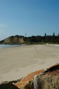 Walking on a deserted beach Stock Photos