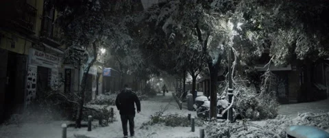 Walking into desolate street during blizzard.Editorial. Madrid.Spain. 01/08/2021 Stock Footage 148394039
