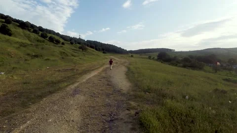 Walking dirty road Stock Footage 199305496