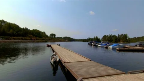 Walking on a dock in Temagami Ontario Stock Footage 162909534