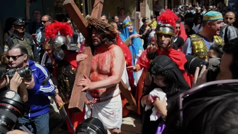 Walking Via Dolorosa in Jerusalem on Good Friday Stock Footage 317728967