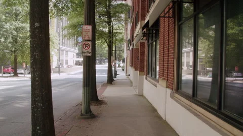 Walking Down Atlanta Sidewalk By Brick Building 4K 48FPS SLO-MO Stock Footage 270447703