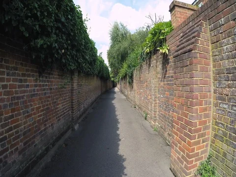 Walking down a back alley Stock Footage 79206498