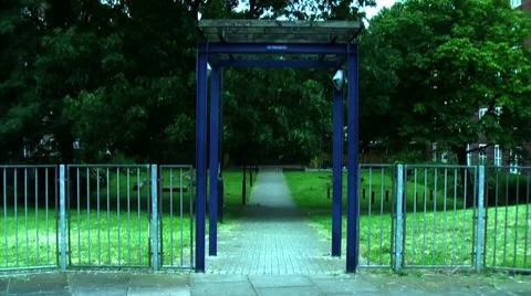 Walking down blue frame narrow path Stock Footage 8659180