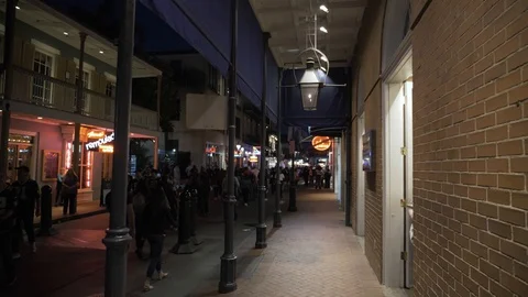 Walking down Bourban in New Orleans Stock Footage 123710984