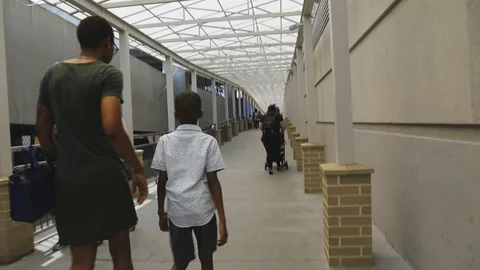 Walking down busy sidewalk Stock Footage 90362470